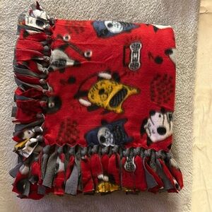50x60” fleece tie blanket.  Puppy pattern fleece with gray fleece backing
